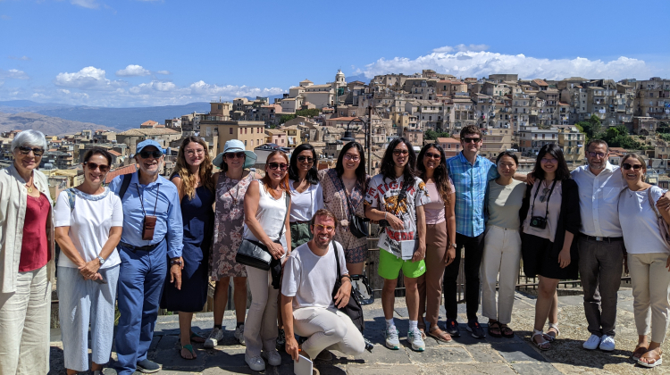 group of men and women in an Italian village