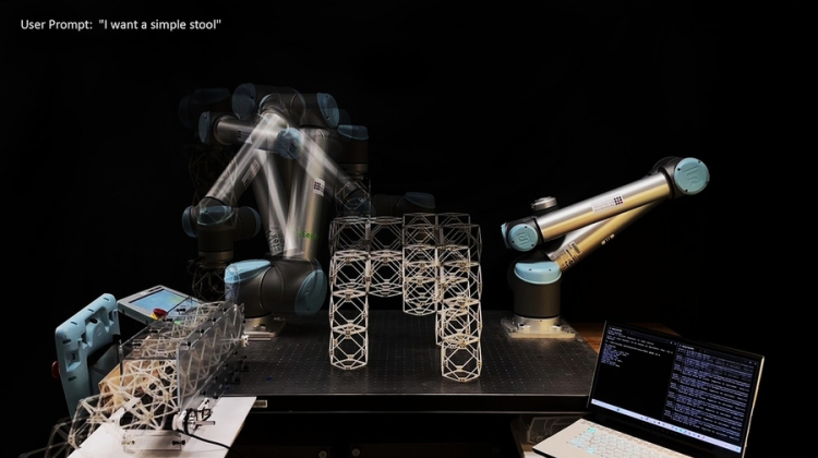 Still image of a robot arm building a chair