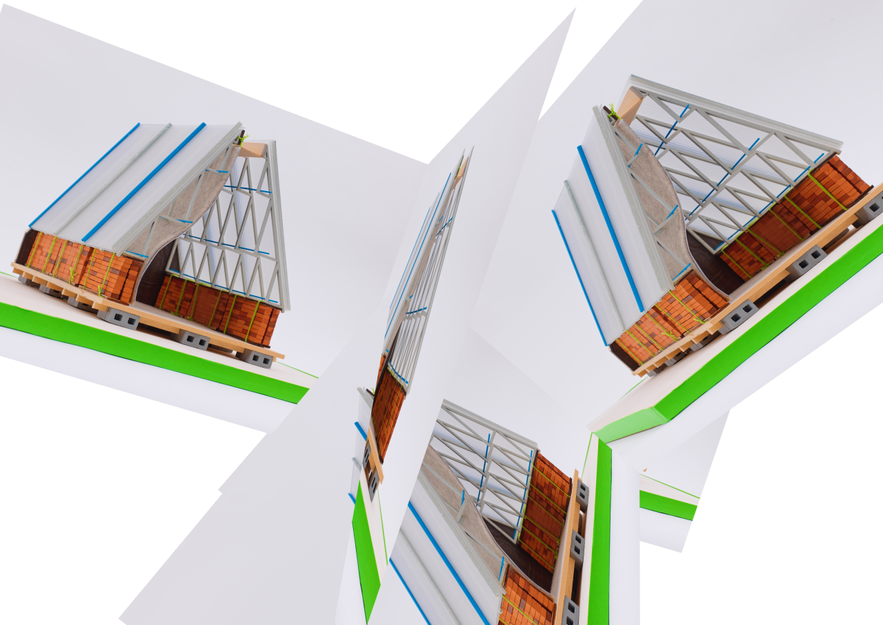 Architectural model of a house cut open to show its layers of brick, timber framing and insulation, repeated across folded planes.