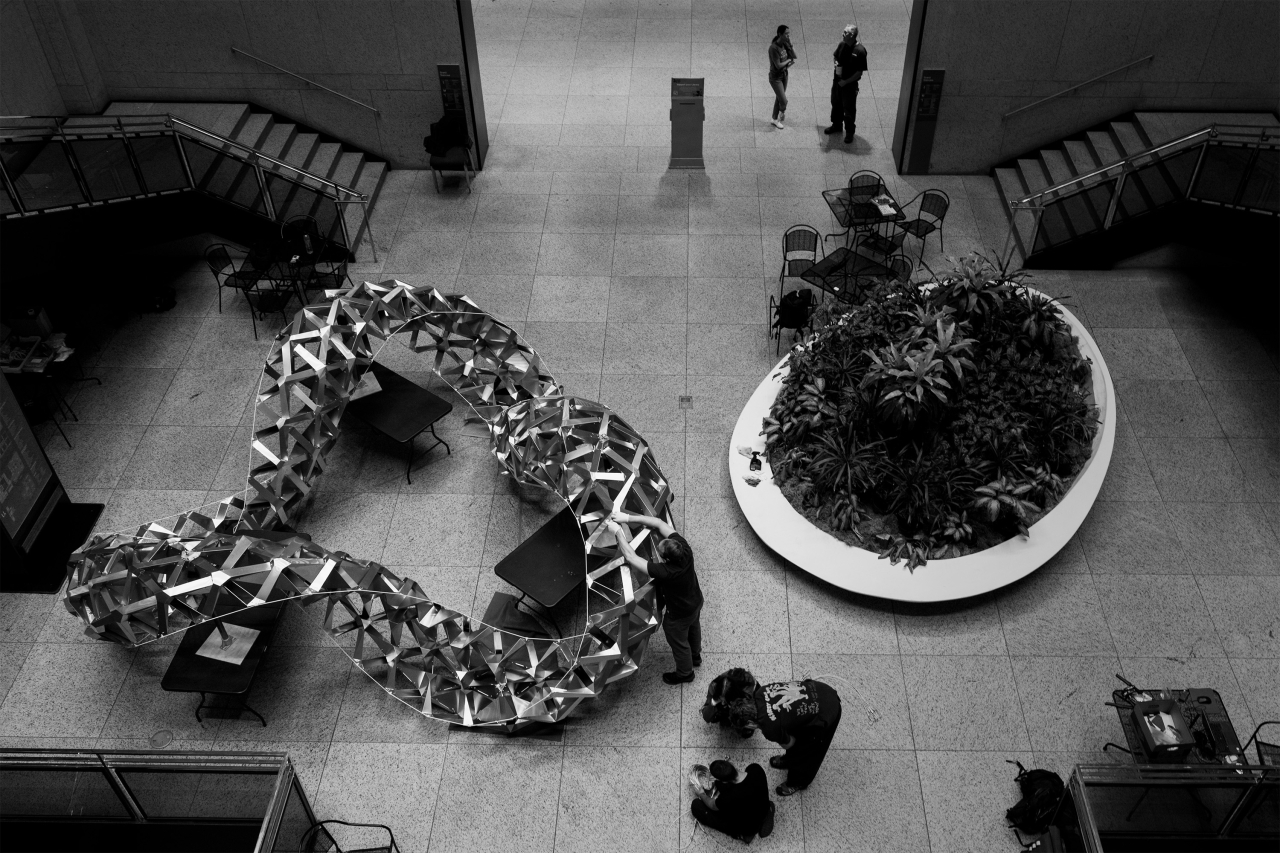 MIT researchers developed a new type of origami-based construction method that could be used to build complex structures that are cheaper and easier to assemble, and use less material than those built with some conventional techniques. The foldable metal sculpture, Lexicon, was recently hung at the Boston Public Library.