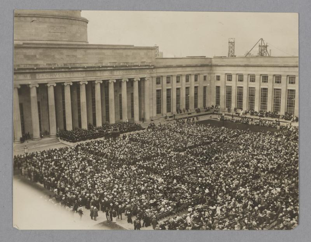 Photograph of the 1916 Alumni Day Dedication Ceremony, photo taken of a large crowd from a rooftop.