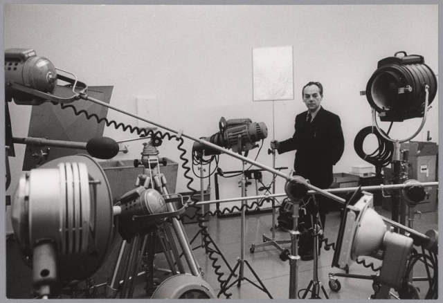 Photo of György Kepes with lighting equipment.